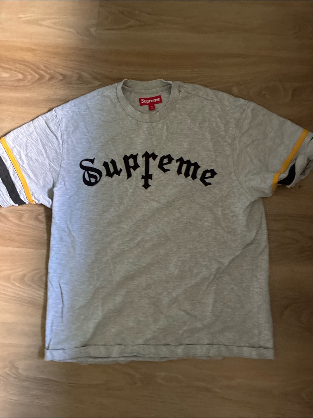 Supreme Grey Tee with Black Gothic Logo and Yellow Sleeve Stripes